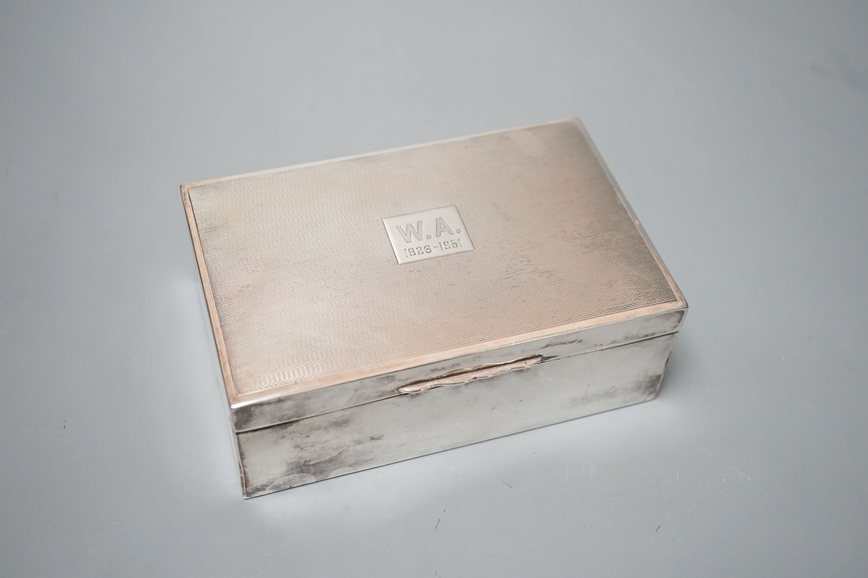 A 1950's part engine turned silver mounted cigarette box, 14.3cm, gross 14.5oz